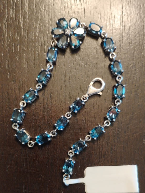 D Joy Jewelry - London Blue Topaz Flower Tennis Bracelet In Rhodium Over 925 Sterling Silver